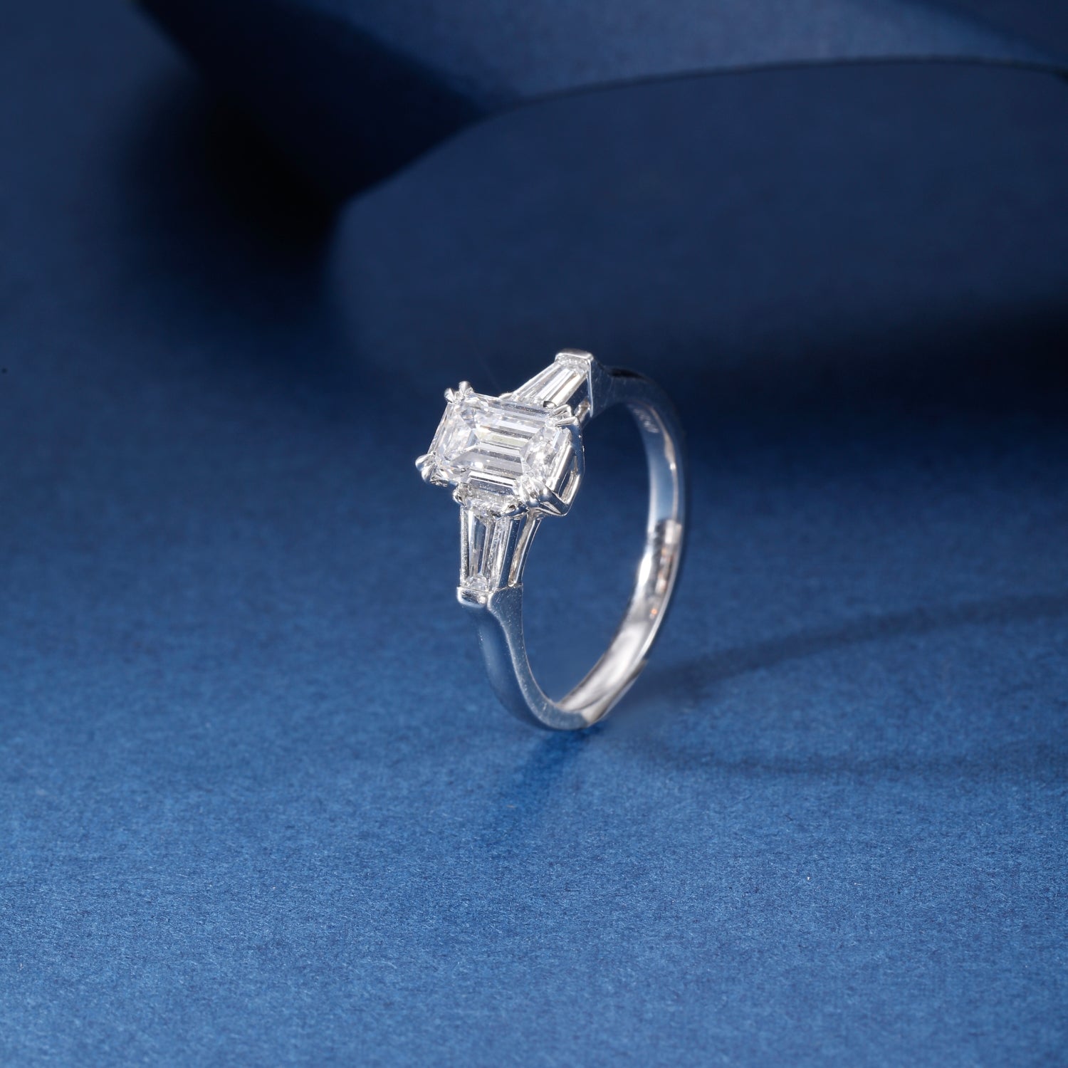 CF26-R007 | Emerald Cut 3-Stone Ring | Tapered Baguette Accents & 6-Prong