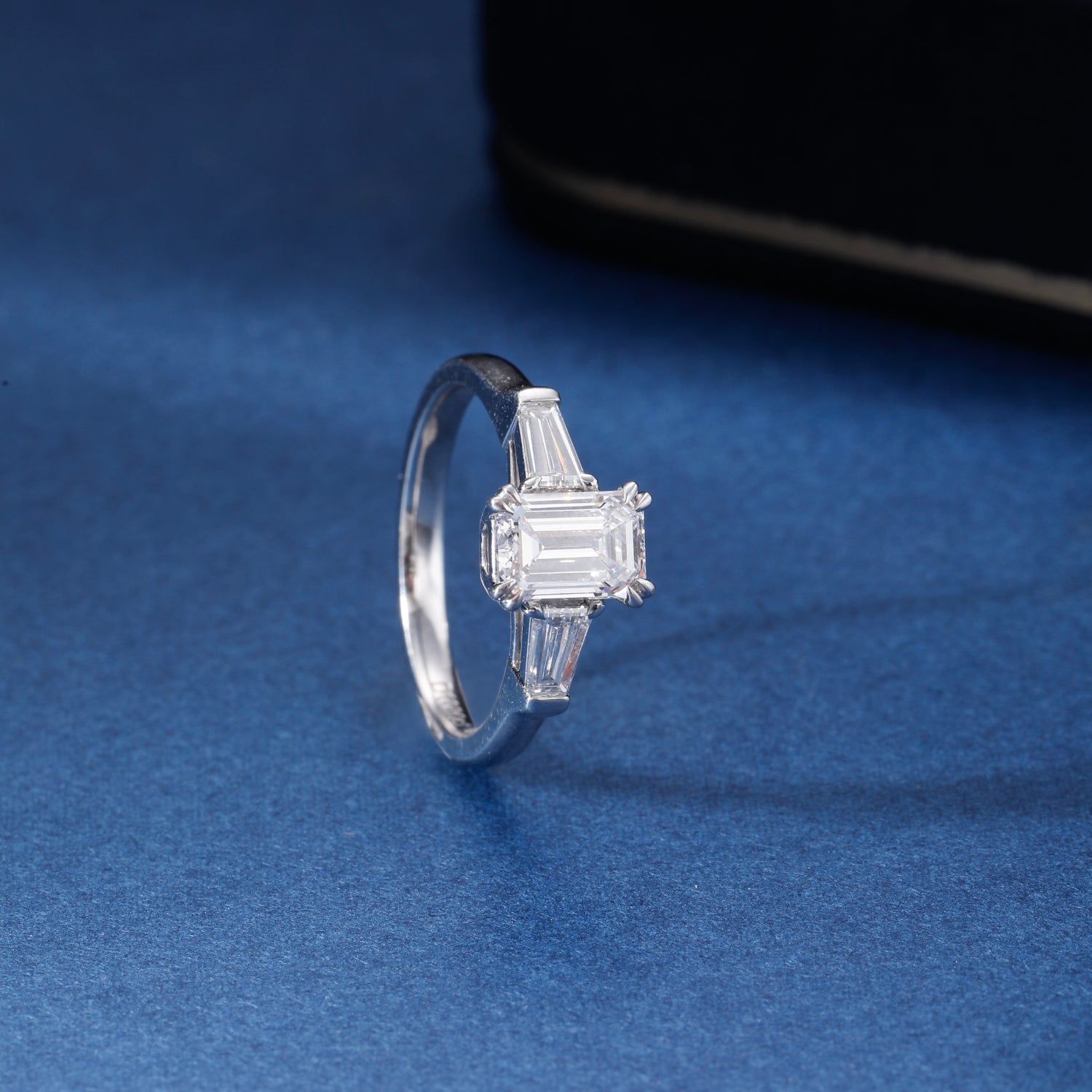 CF26-R007 | Emerald Cut 3-Stone Ring | Tapered Baguette Accents & 6-Prong