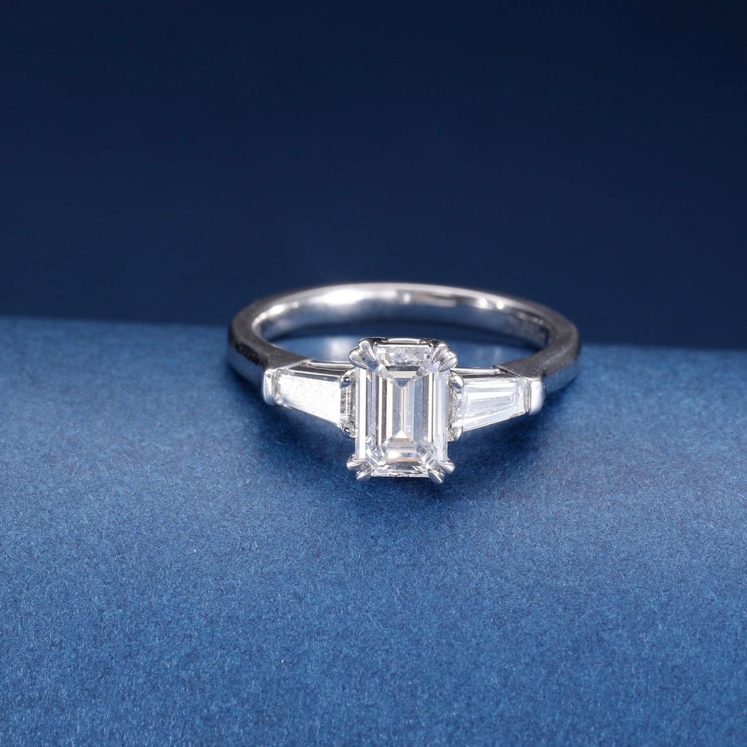 CF26-R007 | Emerald Cut 3-Stone Ring | Tapered Baguette Accents & 6-Prong